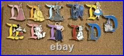 10 Disneyland hidden Mickey pins And 70th Anniversary pins