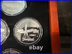 Disneyland 60th Anniversary Silver Plated Medallions set of 7 coins