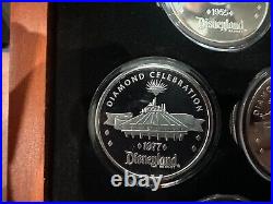 Disneyland 60th Anniversary Silver Plated Medallions set of 7 coins