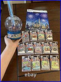 Disneyland 65th Anniversary- Set Of 13 attraction pins LE 2000 & Snow Globe Cup