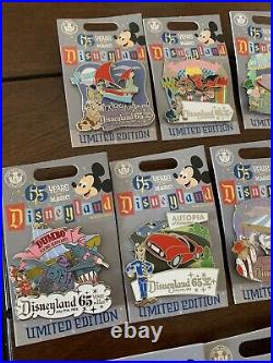 Disneyland 65th Anniversary- Set Of 13 attraction pins LE 2000 & Snow Globe Cup