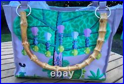 Disneyland's Enchanted Tiki Room 40th Anniversary Lavender Tangaroa Purse EUC Disneyland's Enchanted Tiki Room 40th Anniversary Lavender Tangaroa Purse EUC