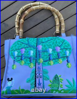 Disneyland's Enchanted Tiki Room 40th Anniversary Lavender Tangaroa Purse EUC Disneyland's Enchanted Tiki Room 40th Anniversary Lavender Tangaroa Purse EUC