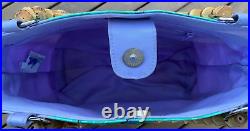 Disneyland's Enchanted Tiki Room 40th Anniversary Lavender Tangaroa Purse EUC Disneyland's Enchanted Tiki Room 40th Anniversary Lavender Tangaroa Purse EUC