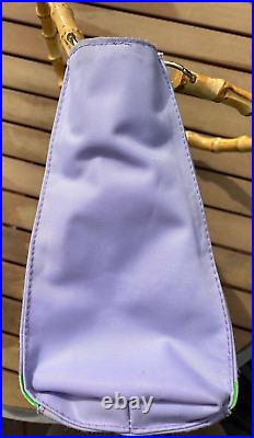Disneyland's Enchanted Tiki Room 40th Anniversary Lavender Tangaroa Purse EUC Disneyland's Enchanted Tiki Room 40th Anniversary Lavender Tangaroa Purse EUC